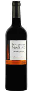 A bottle of Château Massiac Sentinelle de Massiac Minervois red wine with a white and orange label featuring a cypress tree silhouette, isolated on a white background.