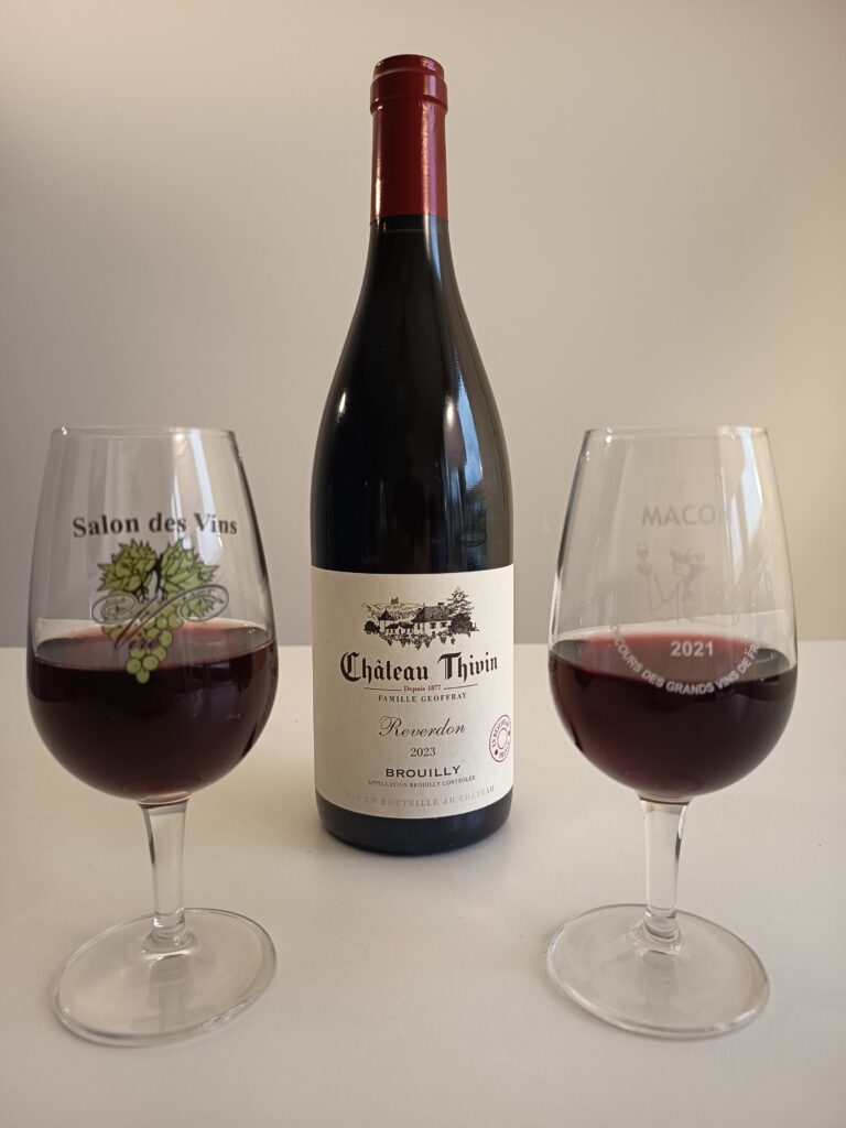 Focus on the bottle of Château Thivin Brouilly C.D.O wine cuvée Reverdon. A benchmark wine of Beaujolais region