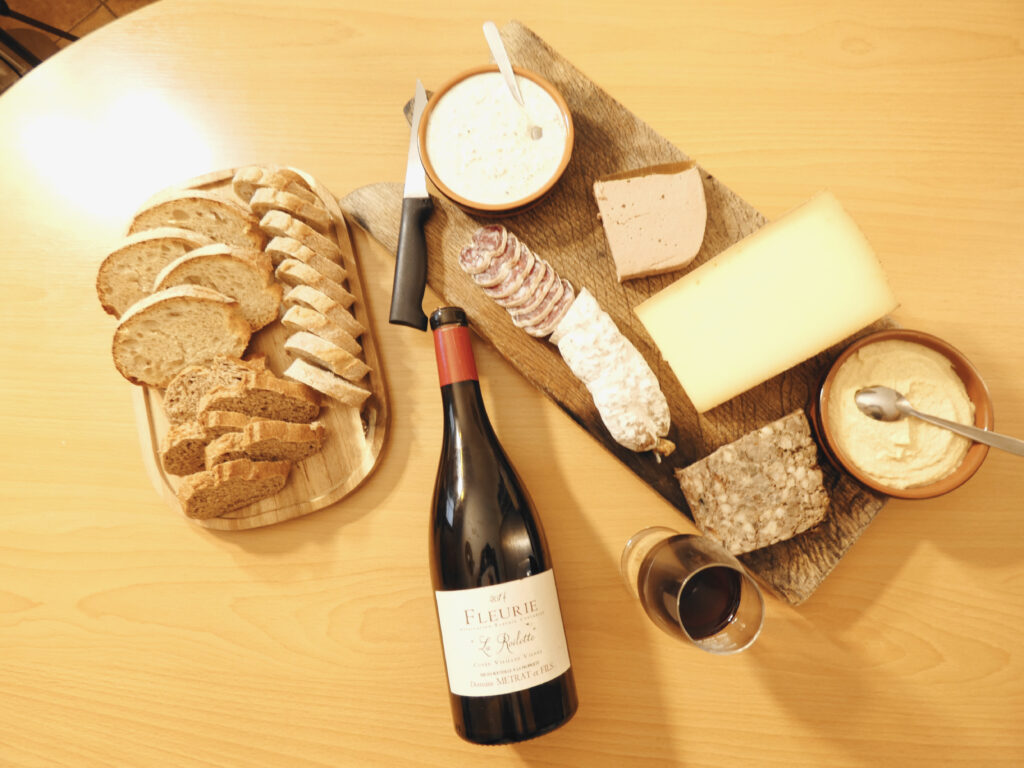 Fleurie Beaujolais wine from Domaine Metrat together with a charcuterie board.